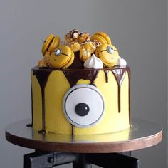 a yellow cake with chocolate and marshmallows in the shape of an eye