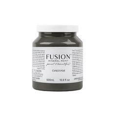 a jar of blue food coloring on a white background with the words, fusion mineral paint