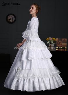 White Renaissance Victorian Era Dress Lace Ruffles Ball Gown     Condition: Brand New   Color:  White   Material: Brocade， Lace   Sleeve Length: Short Sleeve   Dresses Length:Floor-Length   Neckline:  Square Collar   Decoration: Ruffles + Lace + Flower   Package Includes: Dress            Whether you're looking for a Vintage Revolutionary,Regency,Early Victorian,Pioneer Women,Old West,Civil War Era,Polonaise Sets,Victorian Era,Edwardian, Bustle Dresses Clothing or Hi Ruffled Ball Gown For Banquet, Ruffled Ball Gown For Banquets, White Floor-length Dress For Debutante Ball, White Ball Gown Evening Dress, White Ruffled Gown For Costume Party, Ruffled Ball Gown Maxi Dress For Wedding, White Ball Gown For Costume Party, Empire Waist Wedding Dress With Ruffles, Empire Waist Ruffle Wedding Dress