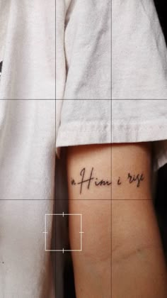 a person with a small tattoo on their left arm and the words, no human is wrong