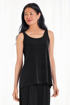 Knit Top - This essential layering tank is smooth and flattering in matte jersey. Elegant Seamless Camisole For Layering, Elegant Scoop Neck Tank Top For Everyday, Elegant Seamless Tops For Everyday, Chic Seamless Camisole For Layering, Fitted Modal Tank Top For Layering, Versatile Scoop Neck Tank Top With 4-way Stretch, Versatile 4-way Stretch Scoop Neck Tank Top, Elegant Seamless Tank Top With Minimal Stretch, Summer Layering Tank Top With Minimal Stretch