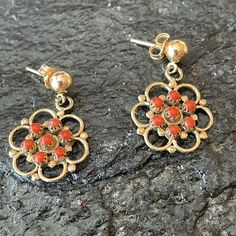 Gorgeous Rare 14k Gold Red Coral Earrings. Zuni Native American Handcrafted Delicate Dangles Shaped Like A Flower With 7 Red Coral Stones In Each Center. Stunning Eye Catching Beauties. 1” Full Drop Length 5/8” Size Of Flower 3.8 Grams Weight Marked 14k Gold By The Artist New Never Worn Condition From Vintage 80’s Collection G147 Red 14k Gold Pierced Earrings, Red Dangle Filigree Jewelry, Red Filigree Dangle Jewelry, Red Sterling Silver Filigree Earrings, Red Filigree 14k Gold Jewelry, Red 14k Gold Filigree Jewelry, Red Filigree Dangle Earrings, Orange Fine Jewelry With Matching Earrings, 14k Gold Red Earrings For Pierced Ears