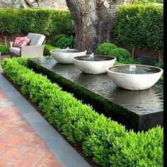 an instagram page with two bowls on top of a water feature in the middle