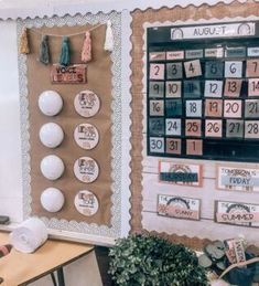 a bulletin board with calendars hanging on it