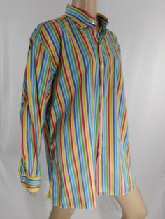 "Men's Shirt Long Sleeve Rainbow Striped Buttons Like New Condition Vintage by SOLEMARE MAUST & HOFFMAN Size XL Made in ITALY FABULOUS ITALIAN SHIRT Substantial high quality woven 100% COTTON fabric. Long sleeve, tiny collar, side slits, extra long,white buttons, front pocket. Super high quality. Made in ITALY. Excellent LIKE NEW condition. Easy to wear casual chic vintage for the disco sporting life. MEASUREMENTS: Length - 33\" Chest (underarms to underarms) - 25\"x2 Sleeve (shoulder to cuf Multicolor Collared Shirt For Daywear, Casual Multicolor Blouse With Spread Collar, Multicolor Long Sleeve Daywear Shirt, Multicolor Long Sleeve Tops For Daywear, Casual Multicolor Shirt For Daywear, Casual Multicolor Daywear Shirt, Striped Shirt Men, Italian Shirts, 80s Shirts