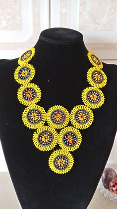 Yellow Zulu Beaded Necklace, Zulu African Beaded Jewelry, African Necklace, Handmade Necklace, Multi color Necklace, Gift For Her, NecklaceThis colorful beaded necklace is superbly crafted which can be worn with any outfit at different occasions and it will absolutely makes you stand out.Main color - yellow.The necklace can be available in different colors.Wholesale available at a fair price,please contact me.For any clarification,please send me a convo or an e-mail.Thank you for visiting and ha African Beaded Jewelry, Colorful Beaded Necklace, Multicolor Necklace, Multi Coloured Necklaces, African Necklace, Handmade Sandals, Beaded Sandals, Color Necklace, African Beads