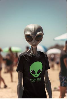 an alien wearing a t - shirt with the words humans on it