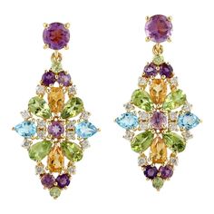 Cast from 14K gold, these multi gemstone earrings are true stunners. It is hand set with 1.9 carat amethyst, .85 citrine, .80 peridot, .80 carats topaz and .36 carats of diamonds. FOLLOW MEGHNA JEWELS storefront to view the latest collection & exclusive pieces. Meghna Jewels is proudly rated as a Top Seller on 1stDibs with 5 star customer reviews. All items manufactured by us are handmade and can be customized or redesigned. Composition Size-32X16 MM Total Weight-7.69 Gold Weight(Gms)-6.508 Diam Treasure Jewelry, Alexis Bittar Jewelry, Gem Diamonds, Jeweled Earrings, Gold Diamond Jewelry, Expensive Jewelry, Fabulous Jewelry, Diamond Gold, Top Seller