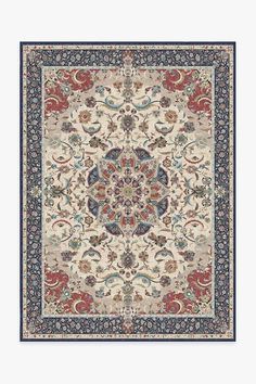 ruggable with an ornate design in blue, beige and red colors on the floor