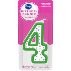 a birthday candle with the number four on it's front in a card package