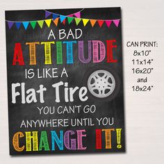 a chalkboard sign that says, a bad attitude is like a flat tire you can't go anywhere until you change it