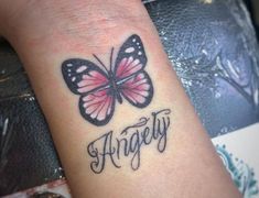 a butterfly tattoo on the wrist that says,'angely'in cursive script