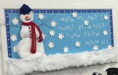 a snowman is standing in front of a bulletin board that says wash me and i shall be wither than snow to dream