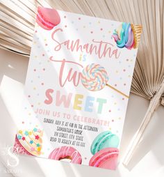 a sweet birthday party sign with donuts and sprinkles on it next to a fan