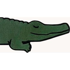 an alligator rug is shown in green and black, with the head resting on it's back