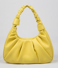 Natural milled soft top grain cowhide. Convenient and carefully crafted Hobo - Dimension W*D*H: 12 3/8 × 3 1/8 × 5 3/4 - Inside zippered back pocket for extra secure storage - Inside second pocket for extra storage - Weight (lb.): 1 Yellow Textured Leather Shoulder Bag For Daily Use, Leather Satchel Shoulder Bag With Pebbled Texture, Leather Shoulder Bag With Grained Texture, Everyday Leather Shoulder Bag With Grained Texture, Yellow Textured Leather Bag, Solid Leather Hobo Bag With Soft Leather Detail, Solid Leather Hobo Bag With Soft Leather, Solid Color Soft Leather Hobo Bag, Solid Textured Leather Bags