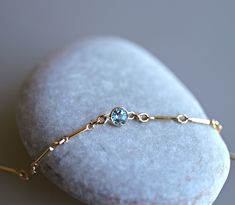 "14k gold filled dainty chain layering bracelets with real gemstones. Perfect for stacking with other bracelets or wear alone. It's a lovely birthday gift, Christmas gift or bridesmaids gift. This bracelet is a custom size and NO RETURN or EXCHANGES on this item. We accept bracelets for resizing if necessary - additional fees may apply. You can choose your bracelet among 6 different type of bracelet with gemstones and length from drop down menu. Gemstones setting with 14k solid gold bezel. 1- Ma Layering Bracelets, Chain Layering, Dainty Gold Chain, Topaz Bracelet, Blue Topaz Jewelry, Citrine Bracelet, Blue Topaz Bracelet, Gems Bracelet