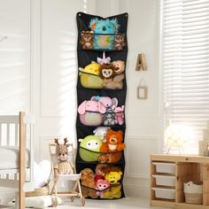 a child's room with stuffed animals on the wall and toys in baskets behind it