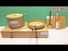 the kit is made out of cardboard and has four items in it, including an empty container