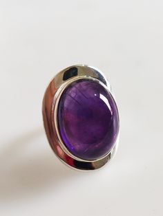 Gorgeous African Amethyst Ring Made with Sterling Silver Handmade Ring Made in india Ring Gemstone Size: 20x16 MM Top Quality Natural Amethyst Ring made with Sterling Silver 925 lovely Ring Very comfortable Ring Purple Oval Cabochon Hallmarked Ring, Purple Amethyst Oval Cabochon Ring, Oval Amethyst Cabochon Ring, Spiritual Oval Purple Ring, Spiritual Oval Amethyst Ring With Stone Setting, Spiritual Hallmarked Amethyst Ring, Purple Cabochon Amethyst Ring, Purple Oval Cabochon Ring, Amethyst Ring With Large Stone