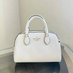 Nwt Kate Spade Kf493 Madison Leather Small Duffle Satchel Crossbody Bag Meringue Product Details Measurements 9.06" D Strap Drop: 3.15" Handle Drop: 3.25" Features Strap Drop: 22 Metal Pinmount Logo Closure Type: Top Zip Closure Dust Bag Included: No Back Zip Pocket Materials Saffiano Leather Lining: Two Way Script Logo Lining Imported Style Number Kf493 Kate Spade Handbags White, White Formal Shoulder Bag With Zipper Closure, Formal White Shoulder Bag With Zipper Closure, White Evening Bag With Zipper Closure, White Satchel With Zipper Closure For Office, Luxury White Satchel With Zipper Closure, White Shoulder Bag With Zipper Closure For Evening, Elegant White Satchel With Zipper Closure, White Handheld Satchel For Evening