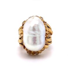 Vintage Mid-Century Pearl & Diamond Cocktail Ring in 18k Yellow Gold This Mid-Century inspired cocktail ring truly shines! A stunning Mabe pearl is the centerpiece of the ring, surrounded by forty (40) round brilliant cut diamonds. The diamonds measure 1.6 mm and weigh .018 carats each.  This ring is sure to make a statement, whether you wear it for a night out or save it as a special heirloom. A timeless addition to any jewelry collection. PRIMARY STONE Stone: Pearl Measurements: 20.32 mm x 13. Baroque Ring, Diamond Cocktail Ring, Mabe Pearl, Diamond Cocktail Rings, Pearl Diamond, Shop Engagement Rings, Round Brilliant Cut Diamond, Cocktail Ring, Brilliant Cut Diamond