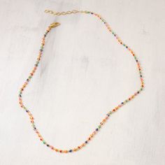 Everything goes with everything Super colorful enamel balls decorate a gold-plated chain Length: 18-20 inches Nickel-free gold plated chain and clasp Everything Goes, Enamel Necklaces, Colourful Necklace, Gold Plated Chains, Earring Necklace, Chain Lengths, Chain Length, Necklaces Bracelets, Jewelry Shop