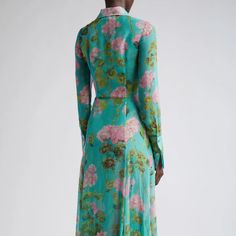 Elevate your evening ensemble with this Robe geranium-print silk chiffon maxi dress. Crafted from luxurious materials, this tenue-de-soiree is designed with long sleeves and ruffles for a look that is both elegant and timelessly sophisticated. Slip it on for a graceful evening look with a hint of glamour. Cocktail Georgette Maxi Dress, Long Sleeve Chiffon Midi Dress For Garden Party, Feminine Silk Chiffon Maxi Dress, Floor-length Floral Print Silk Chiffon Maxi Dress, Floor-length Silk Chiffon Maxi Dress With Floral Print, Floral Print Silk Chiffon Floor-length Maxi Dress, Green Long Sleeve Georgette Maxi Dress, Spring Green Georgette Maxi Dress, Green Georgette Maxi Dress With Long Sleeves