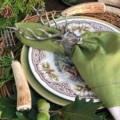 elk napkin ring with cloth napkin at rustic lodge tablescape with deer antler and stag horn accessories Rustic Lodge Decor, Rustic Napkin Rings, Elk Head, Rustic Napkins, Luxury Tableware, Entertaining Essentials, Lodge Style, Lodge Decor, Rustic Lodge