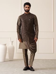 Up your style game with this Mehandi Green Color jacket, uniquely designed and embroidered all over by hand and machine Work . Comes with a Cowl Kurta with frills and fitted Trouser to give a more refined and sophisticated look  The Nehru jacket and kurta pyjama set are crafted from excellent art silk fabric.  NOTE:Cost Includes Stitched Kurta, Nehru Jacket & Matching Pyjama mens kurta pyjama with Nehru jacket,wedding kurta pyjama with nehru jacket,kurta pajama with nehru jacket for wedding,latest kurta pajama with nehru jacket Brown Nehru Jacket For Men, Bandhgala With Chikankari Embroidery For Eid, Eid Bandhgala With Chikankari Embroidery And Stand Collar, Eid Nehru Jacket With Zari Work And Stand Collar, Stand Collar Sherwani For Diwali, Traditional Nehru Jacket With Stand Collar For Eid, Diwali Nehru Jacket With Chikankari Embroidery For Groom, Festive Nehru Jacket With Chikankari Embroidery For Groom, Festive Nehru Jacket For Eid With Stand Collar