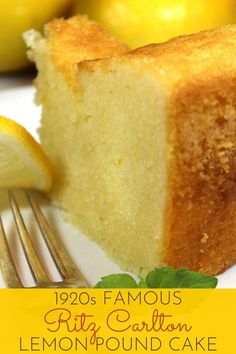 a close up of a slice of cake on a plate with lemons in the background