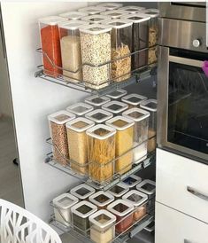 an organized kitchen pantry with food in containers