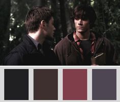 two men standing next to each other in the woods with color swatches on them