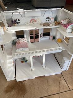 a doll house with all the furniture and accessories