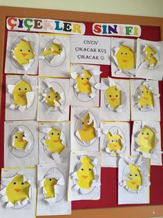 a bulletin board with paper cut out of chicks