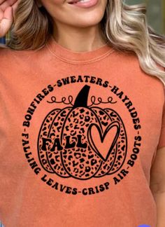 very nice Fall graphic tee including a leopard print pumpkin circled by the words "Sweaters - Hayrides - Boots - Crisp Air - Falling Leaves - Bonfires"   Print is black as shown in the picture, printed on a quality Gildan dryblend 50/50(or similar) shirt.  These run true to size and should have little to no shrinkage.  Available in adult unisex sizes S-5X.  Great for ladies, women, men, guys, gals. Fall Graphic T-shirt With Slogan, Casual Leopard Print T-shirt For Fall, Leopard Pumpkin Shirt, Leopard Print Pumpkin, Fall Leopard Print Graphic T-shirt, Cotton Leopard Print T-shirt With Graphic, Fall Graphic, Fall T Shirt, Crisp Air