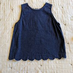 An Og From Stitch Fix, This Top Is Sure To Dazzle! All Over Chambray Construction With White Embroidered Scallop Hem Which Continues To A Split Back. This Top Is In Excellent Condition. Not Nwt, But Never Worn. Falls Into An A-Line Fit. Women's Size Large. Spring Cotton Top With Scalloped Edges, Cotton Tops With Scalloped Edges For Spring, Casual Summer Tops With Scalloped Edges, Casual Tops With Scalloped Edges For Summer, Summer Cotton Tops With Scalloped Edges, Fitted Cotton Tops With Scalloped Edges, Navy Cotton Tank Top For Spring, Indigo Sleeveless Top For Spring, Sleeveless Indigo Tops For Spring