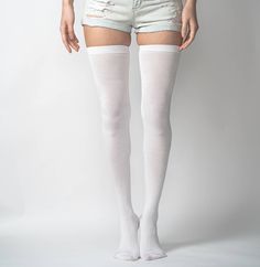 Extra Long Thigh High Socks In a unique blend of micro modal cotton for that silk soft finish, these thigh highs are airy and breathable for a lasting comfort. It is designed to be ultra light for a semi-sheer look with a slight sheen to it. The perfect accent and addition to your look. Details: Features: Ultra Light Semi-sheer Slight Sheen Breathable Soft Hand Feel Material & Care: Material content: micro modal cotton blend Wash & care: machine wash cold with like colors; do not bleach or iron White Thigh High Socks, White Thigh Highs, Thigh Socks, Thigh High Socks, Soft Hands, Soft Hand, Thigh High, High Socks, Knee High Sock