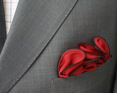 "Our Round Pocket Squares are made from a lightweight, luxuriously soft, 100% pure silk imported from Korea. Each pocket square is enriched with a lustrous border, made from specialty thread of the finest quality. What makes our hankies especially handsome is the natural springiness in our silk, which allows you to shape the pocket square in different ways in your pocket. No two are exactly alike, just like us. SIZE: 12\" diameter COLOR:  Red BORDER COLOR: Select From Teal (Select Color \"Green\ Red Pocket Square, Blue Pocket Square, Wedding Hankerchief, Pocket Square Wedding, Silk Handkerchief, Red Pocket, Red Border, Pocket Squares, Pocket Square