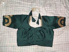 This is a very beautiful handmade Green blouse for women and girls. you can wear this blouse on occasions like diwali, wedings, engagement, anniversaries etc. this blouse can be used for gifting purpose also. this trendy beautiful blouse can give your personality a elegant look. you can wear this blouse with very beautiful sarees and lehangas. we will do the customization also as per the customer need. free shipping worldwide Designer Cotton Silk Choli With Gota Work, Designer Cotton Silk Blouse With Gota Work, Festive Cotton Silk Blouse With Gota Work, Eid Cotton Silk Blouse Piece With Dori Work, Elegant Gota Work Blouse For Eid, Festive Gota Work Blouse For Eid, Unstitched Designer Blouse Piece With Gota Work, Silk Blouse Piece With Gota Work For Eid, Raw Silk Gota Work Blouse