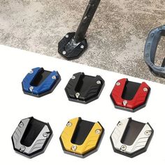 several different colors and sizes of bicycle pedals