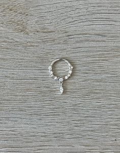 "This septum piercing is made of 14K gold, with CZ crystals. and moon and star designs. This is a great, dainty but sparkly everyday option, that you can put in and leave in!  Available in 8mm or 10mm inner diameter options. Available in white gold or yellow gold. Piercing \"clicks\" into place. Super dainty minimalist look - drop jaws with this body jewelry! This clicker can be used for many piercings, including septum rings, daith earrings, cartilage hoops, conch rings, etc. **PACKAGE INSURANCE: Please either upgrade to priority express shipping at checkout if you would like to insure your package OR you can also purchase insurance separately Insurance up to $100 for $1.50 here:  https://www.etsy.com/listing/1296961518 Insurance up to $200 for $2.00 here: https://www.etsy.com/listing/131 Wedding Piercings In White Gold With Cubic Zirconia, White Gold Cubic Zirconia Piercings For Wedding, Wedding White Gold Piercings With Cubic Zirconia, Wedding White Gold Sterling Silver Piercings, Elegant Silver Hypoallergenic Septum Ring, White Gold Piercings With Diamond Accents, Silver Diamond Piercing In Fine Jewelry Style, Silver Hoop Piercings In 14k Gold, Fine Jewelry Diamond Silver Piercing