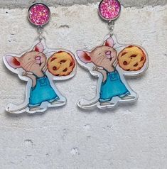 These storybook character earrings are a must-have for any fan of the beloved children's book, "If You Give A Mouse A Cookie". The earrings feature the lovable mouse character and are perfect for adding a touch of whimsy to any outfit. Crafted with care, these dangle/drop earrings are sure to make a statement. They are perfect for children and adults alike who love the book and its iconic characters. Add these earrings to your jewelry collection today and show your love for "If You Give A Mouse A Cookie". Mouse A Cookie, Storybook Characters, Acrylic Earrings, Fine Jewellery Necklace, Pink Blue, Post Earrings, Childrens Books, Cookies Et Biscuits, Jewelry Collection