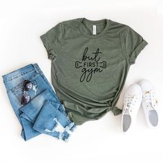 Looking for a cute versatile top to wear? Make sure to grab one of our Graphic tees! This soft and comfortable graphic tee is the perfect top for any outfit. It can be paired with biker shorts, jeans, or even a simple skirt/dress! This tee is true-to-size, so be sure to order your regular t-shirt size! If you are looking for a more oversized look, make sure to size up! Casual Pre-shrunk T-shirt For Workout, Trendy Cotton Workout Tops, Casual Cotton Workout Tops, Casual Summer Workout Shirt, Casual Workout Cotton Tops, Spring Workout T-shirt With Graphic Print, Green Graphic Print Workout Top, Green Workout T-shirt For Spring, Spring Workout T-shirt Relaxed Fit