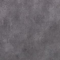 an animal print pattern is shown on the surface of this wallpaper, which has been painted in dark gray tones