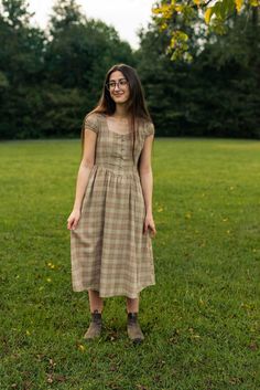 Experience effortless elegance with our Chestnut Dress. This modest dress features a flattering A-line silhouette and a warm plaid print that will carry you through every season. Whether you're attending a social gathering or enjoying a leisurely outing, this dress offers comfort and style in one package. The Chestnut Maxi Skirt Spring, Shabby Chick, Modest Dress, Social Gathering, French Girl, Plaid Print, Mom Style, Modest Dresses, Modest Outfits