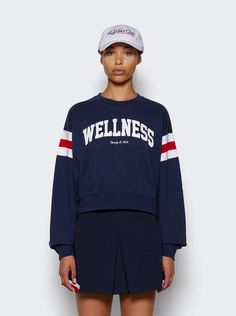 "Find SPORTY & RICH Wellness Ivy Rugby Crewneck on Editorialist. Cropped crewneck sweatshirt Slightly oversized fit Printed stripes around the arms100% Cotton, 11. 5 oz Shrink Free Garment Dyed Dimensions: Model is 5'9\"/175cm and is wearing a size S Composition: 100% Cotton Care: Care according to label" Oversized Sportswear Sweater For Sports, Oversized Athleisure Sweatshirt For Sports, Oversized Varsity Crew Neck Top, Oversized Crew Neck Activewear For Sports, Relaxed Fit Crew Sweats For Sports, Athleisure Sports Sweater With Ribbed Cuffs, Athleisure Sweater With Ribbed Cuffs For Sports, Sporty Sweats With Ribbed Cuffs And Relaxed Fit, Athleisure Crew Neck Sports Sweater