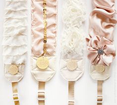 four different types of wedding garters are lined up in a row on a white surface