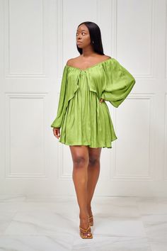 As Kenya Moore would say, 'Gone with the Wind Fabulous'. You'll definitely be muttering that as you sashay down the street in this gorgeous kiwi-green dress with long sleeves, a classic V neck at the front and back, full lining and back tie detail. No one will accuse you of not being a fashion maven with this on! Pair with gold accessories for an elegant look! CONTENT & CARE Hand wash with cold water Do not bleach Iron on low heat Self and Lining: Polyester DEETS & FIT Model is wearing a Green Fitted Off Shoulder Mini Dress, Green Off-shoulder Mini Party Dress, Light Green Long Sleeve Party Dress, Elegant Green Off-shoulder Mini Dress, Green Flowy Mini Dress For Party, Flowy Green Mini Dress For Party, Chic Green Long Sleeve Dresses, Green Off Shoulder Mini Dress For Spring, Chic Flowy Off Shoulder Dress For Spring