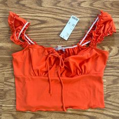 Urban Outfitters Orange Top. Nwt Size Large Trendy Summer Crop Top By Urban Outfitters, Casual Urban Outfitters Crop Top For Spring, Casual Orange Crop Top For Beach Season, Urban Outfitters Crop Top For Spring Vacation, Urban Outfitters Summer Crop Top, Urban Outfitters Orange Tops For Spring, Urban Outfitters Cropped Crop Top For Summer, Spring Orange Tops From Urban Outfitters, Urban Outfitters Vintage Cotton Top